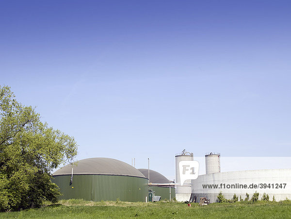 Biomass power station on a green meadow