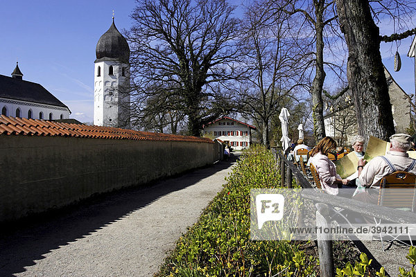 St Irmengard Benedictine Abbey  bell tower and garden restaurant  Fraueninsel  Chiemsee  Chiemgau  Upper Bavaria  Germany  Europe
