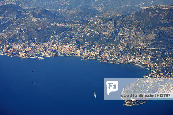 Aerial photo of the Principality of Monaco  Roquebrune Cap Martin on the left  Beausoleil  just behind Monaco  La Turbie middle above  Mont Agel top right  with Basse  Moyenne and Grande Corniche  Principality of Monaco and Alpes Maritimes  Cote d'Azur  France  Europe