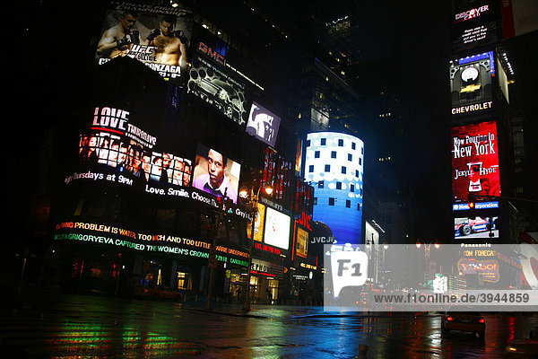 New York Times Square at night in the rain  New York  USA