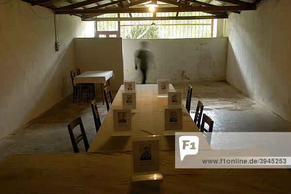 History  furnished cave of the Communist Pathet Lao resistance fighters  table and chairs  old photos of politicians  Tham Than Kaysone Phomvihane  Vieng Xai  Houaphan province  Laos  Southeast Asia  Asia