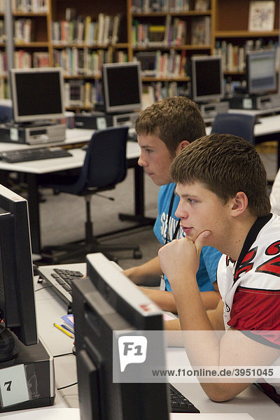 Students in the media center  library  at Lake Shore High School  St. Clair Shores  Michigan  USA