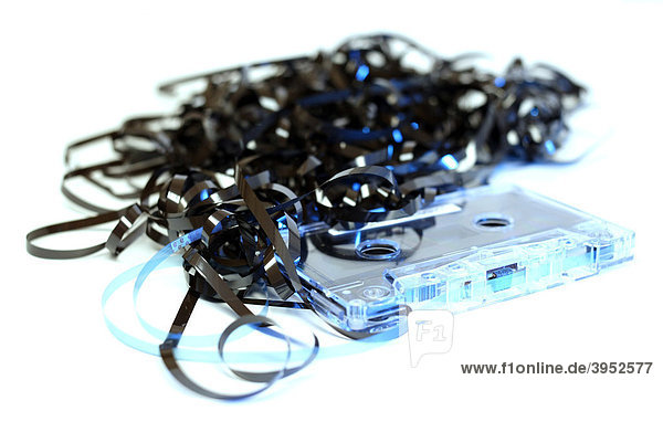 Unspooled and tangled audio cassette tape