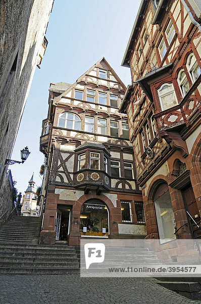 Antiquariat  Buchhandlung  Steile Straße  Treppe  historische Fachwerkhäuser  Altstadt  Marburg  Hessen  Deutschland  Europa