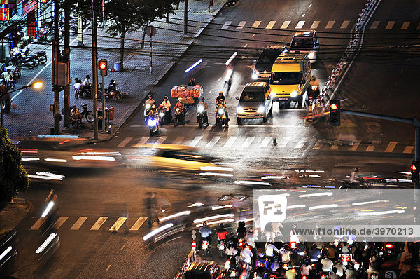 Road junction with traffic at night  Ho Chi Minh City  Saigon  Vietnam  Asia