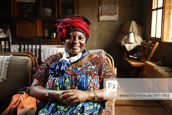 Woman in her living room  Bafoussam  Cameroon  Africa