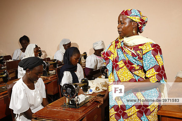 Women using sewing machines  training centre  Maroua  Cameroon  Africa