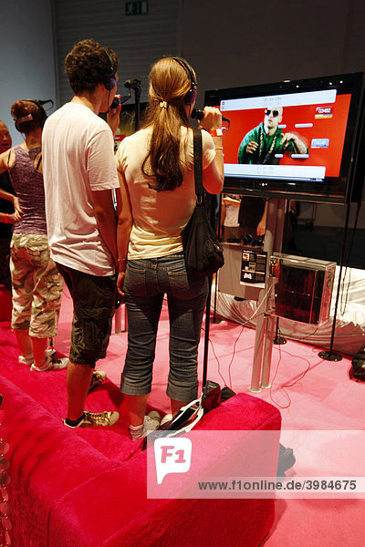 Sony PlayStation Singstar karaoke singing game  stand at the Entertainment Area of the Gamescom  the world's largest fair for computer games in the Messe Koeln Exhibition Center  Cologne  North Rhine-Westphalia  Germany  Europe