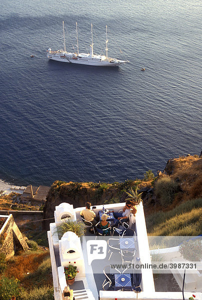 Couples on deck with cruise ship