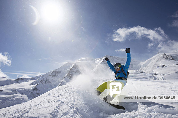 Snowboarder  jump  mountain panorama  St. Moritz  Grisons  Switzerland  Europe