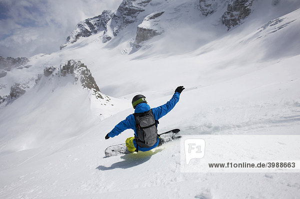Snowboarder  mountain panorama  St. Moritz  Grisons  Switzerland  Europe