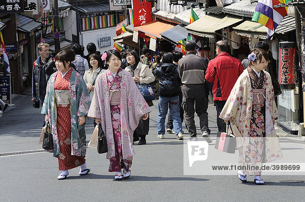 Young people in kimonos in the old town walking to the Kiyomizu-dera temple  Kyoto  Japan  Asia