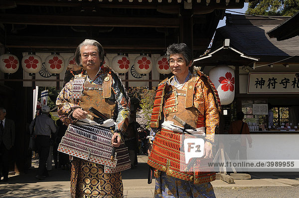 Japanese men dressed as samurai at the Matsuri  shrine festival at the Hirano Shrine  Kyoto  Japan  East Asia  Asia