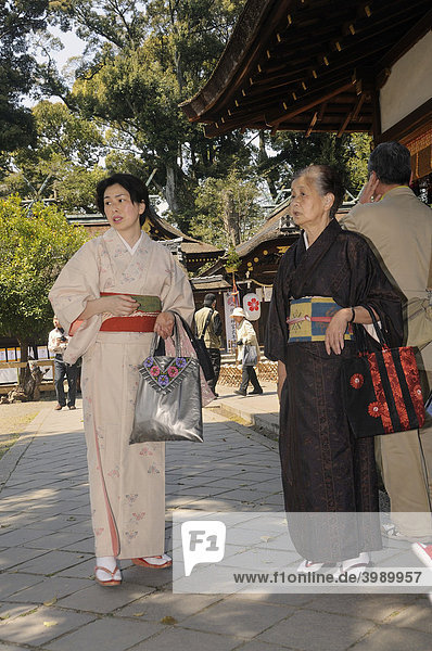 Japanese women in kimonos  at the shrine festival  Matsuri  at the Hirano Shrine  Kyoto  Japan  East Asia  Asia
