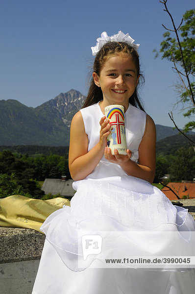 Girl is looking forward to First Communion