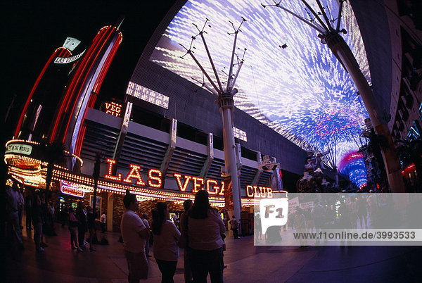 Spectators watching a demonstration of the Fremont Street Experience in downtown Las Vegas  Nevada  USA