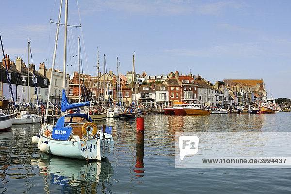Sailboats docked in the old port of Weymouth  Dorset  England  UK  Europe