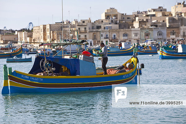Traditional Maltese fishing boat  called Luzzu  port of Marsaxlokk  Malta  Europe