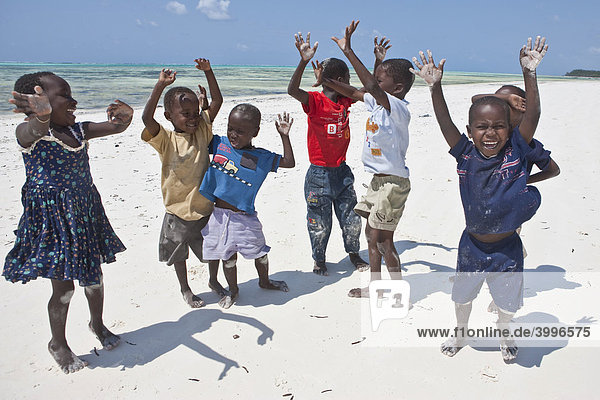 Children playing on the beach  Zanzibar  Tanzania  Africa