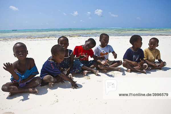 Children playing on the beach  Zanzibar  Tanzania  Africa