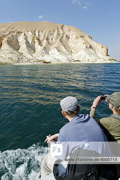 Tourists on a cruise on the Asad reservoir of the Euphrates  Syria  Asia