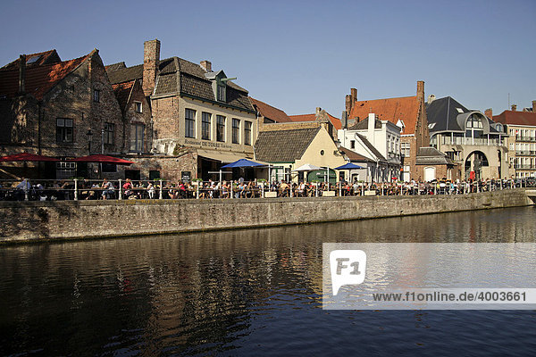Restaurant and beer garden De Torre at a canal in the historic center of Bruges  Belgium  Europe