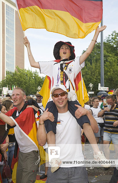 Soccer fans celebrating the 2:0 victory of the German team over Sweden in the last 16  Football World Cup 2006 in Dortmund  North Rhine-Westphalia  Germany
