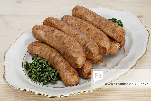 Pinkelwuerste sausages on a dish  north german speciality