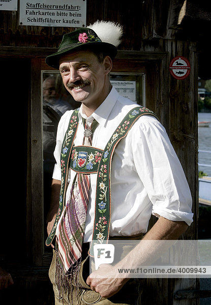 Man wearing the traditional Bavarian costume  in Seehausen on Staffelsee Lake  Bavaria  Germany  Europe