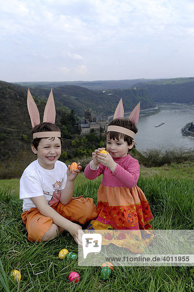 Children looking for Easter eggs at the Rhine River above the Loreley rocks  Patersberg  Rhineland-Palatinate  Germany  Europe