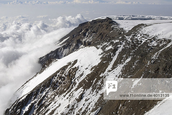 Aerial view of Mt. Kilimanjaro 19335ft or 5895m  Diamond Glacier at the low left  Western Breach and Northern Ice field  top right  Tanzania  Africa