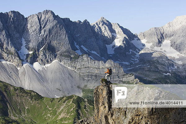 Mountaineer in front of the Karwendel Mountains  North Tyrol  Austria  Europe