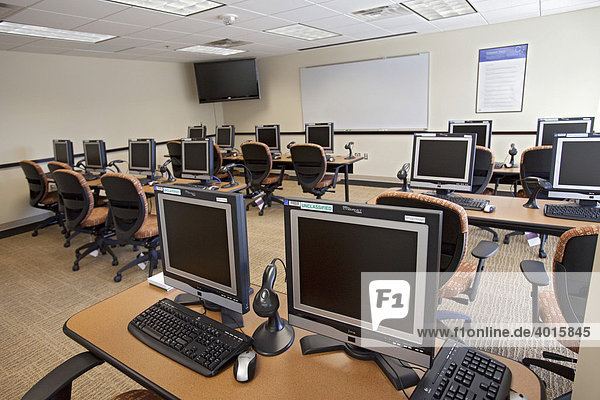 A classroom for new employees learning to handle passport applications at the Detroit Passport Agency  Detroit  Michigan  USA