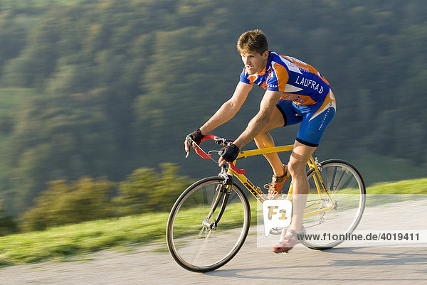 Man riding a racing bicycle