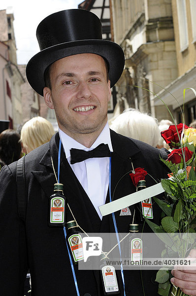 Man wearing a top hat  Gmuender city festival  parade of the 40-year-old people  Schwaebisch Gmuend  Baden-Wuerttemberg  Germany  Europe
