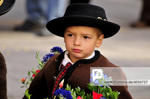 Boy wearing a traditional costume during the Trachtenumzug  traditional costume parade  to the Octoberfest  Munich  Bavaria  Germany  Europe