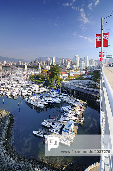 Motor boats at the docks at Fishermen's Wharf Granville Island False Creek Vancouver British Columbia Canada North America