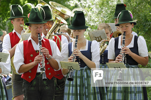 Musicians of the Niklasreuth brassband wearing traditional costumes at the Alt-Schliersee churchday  Lake Schliersee  Upper Bavaria  Germany  Europe