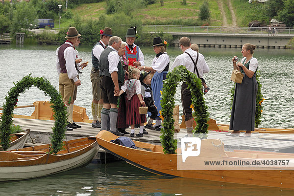 Church boats  barges and historic costumes at the Alt-Schliersee churchday  Lake Schliersee  Upper Bavaria  Germany  Europe