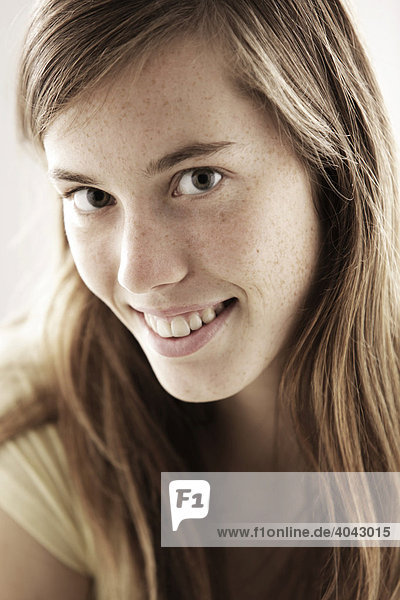 Teenage girl  woman  17 years-old  smiling  portrait