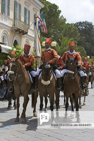 Horsemen wearing traditional costumes at the Cavalcata Sarda parade in Sassari  Sardinia  Italy  Europe