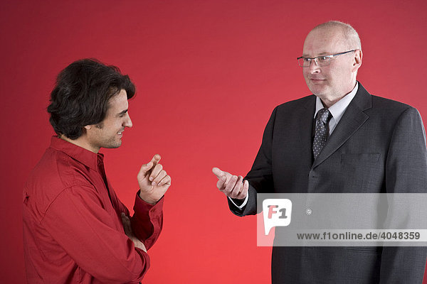 Businessman talking to his assistant