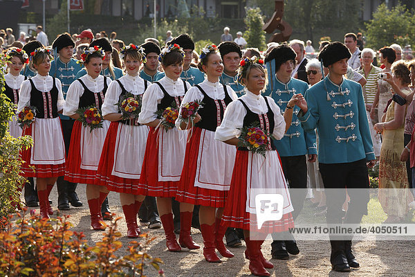 People wearing traditional costumes  Rakoczi Festival  Rosengarten  Bad Kissingen  Rhoen  Lower Franconia  Bavaria  Germany  Europe