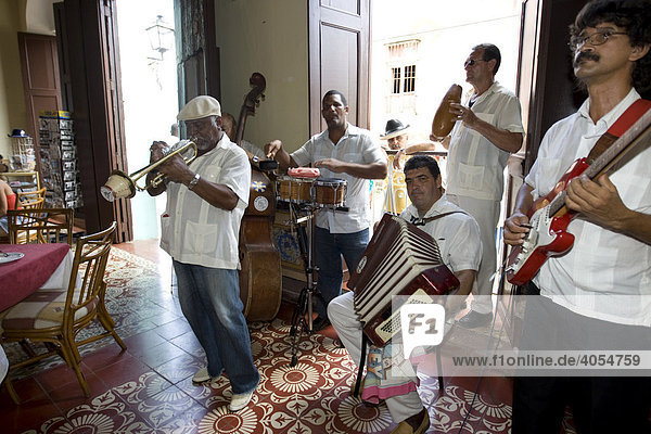 Cuban jazz musicians playing in a restaurant  Plaza Mayor  Trinidad  Sancti-Spíritus province  Cuba  Latin America