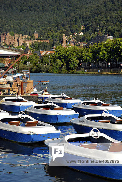 Boat rental on towpath with view of castle and old city  Neckar River  Heidelberg  Neckar Valley  Baden-Wuerttemberg  Germany  Europe
