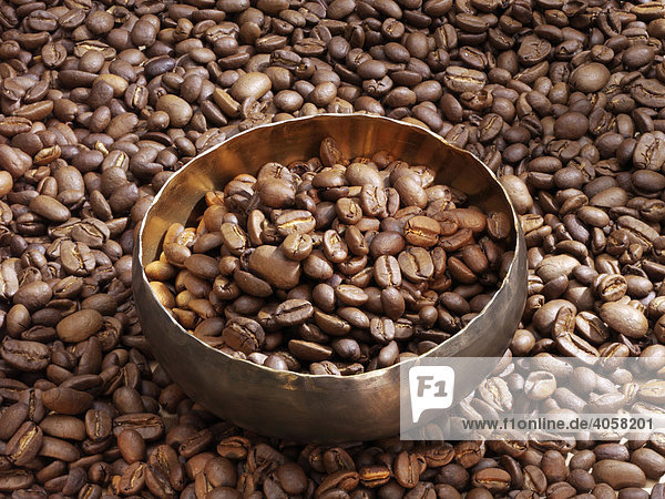 Bronze bowl with coffee beans