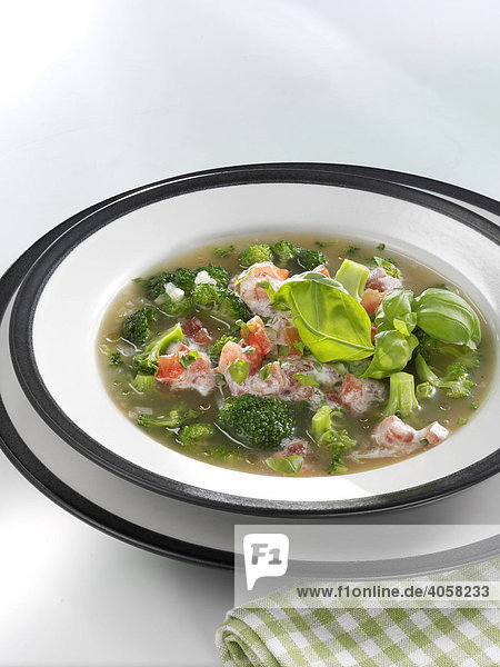 Green cabbage soup in a soup plate