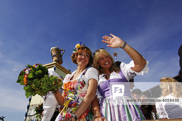 Women in dirndl dresses  Wies'n  October fest  Munich  Bavaria  Germany  Europe