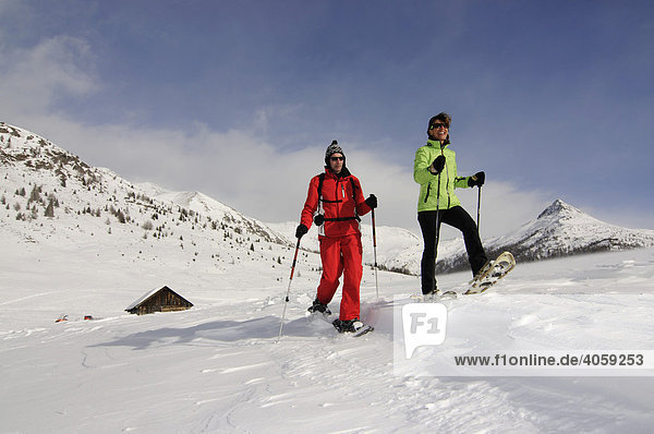 Snowshoe hikers on the Alpe Nemes Alps in the High Puster Valley or Alto Pusteria  Bolzano-Bozen  Italy  Europe