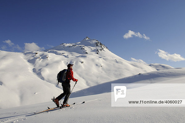 Ski hiker on a tour up Mount Tristkopf  Kelchsau  Tyrol  Austria  Europe